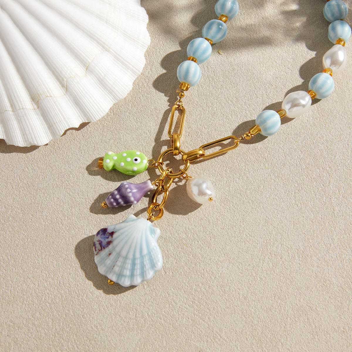 Blue Shell Charm Necklace – Coastal Beach Inspired Gold Jewelry